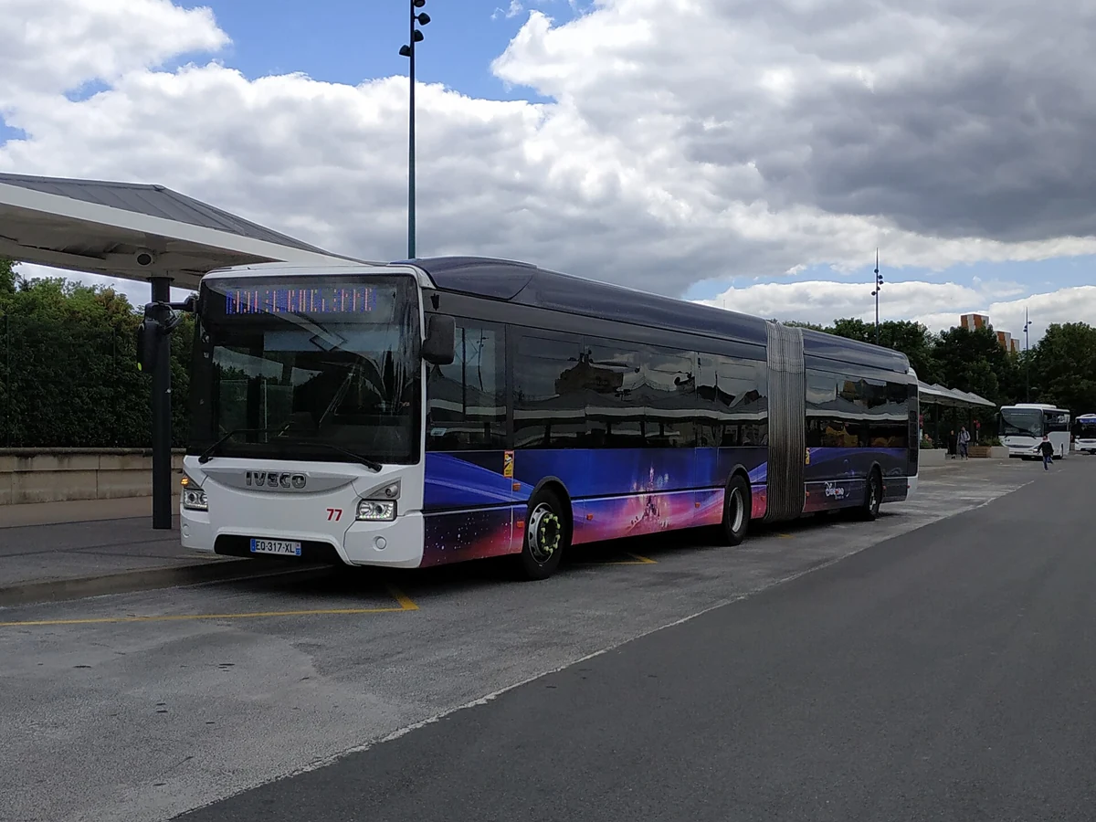 Disneyland Paris shuttle bus at Marne-la-Vallée-Chessy station on a day trip from Paris by train