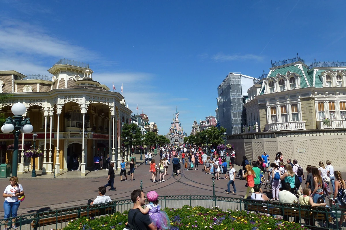 Main Street, U.S.A. in Disneyland Park with the castle in the distance, a family day trip from Paris