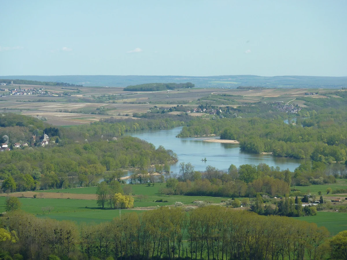 Loire river winding through green countryside seen from Sancerre, a Loire Valley day trip from Paris